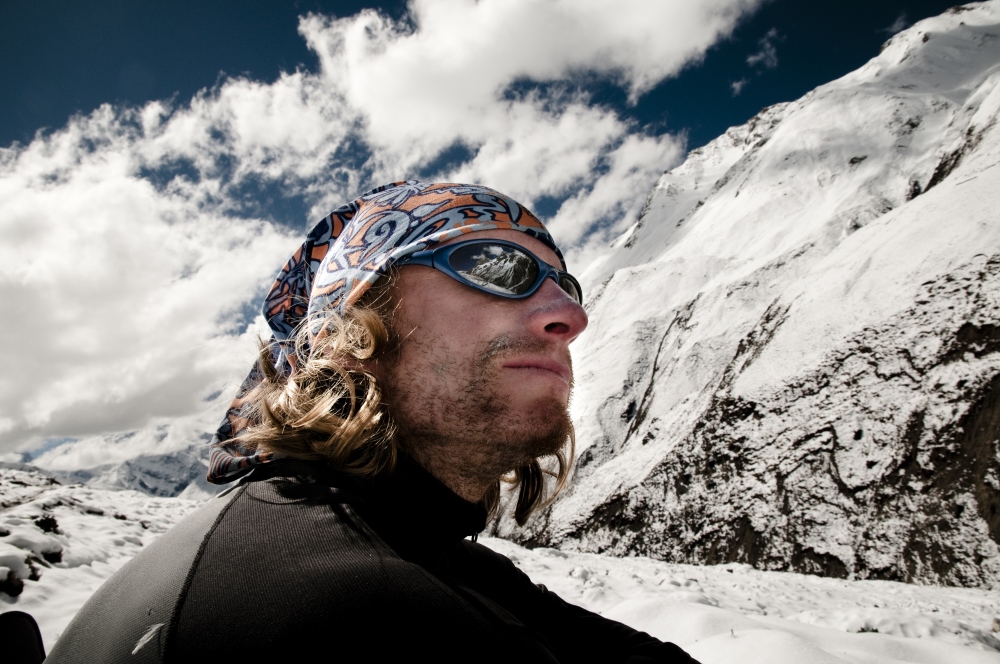 Portrait Norman Bücher vor Himalayagebirge © Christian Frumolt